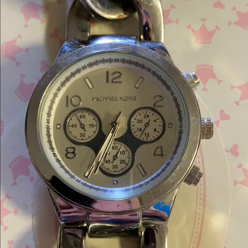 2 authentic Michael Kors watches